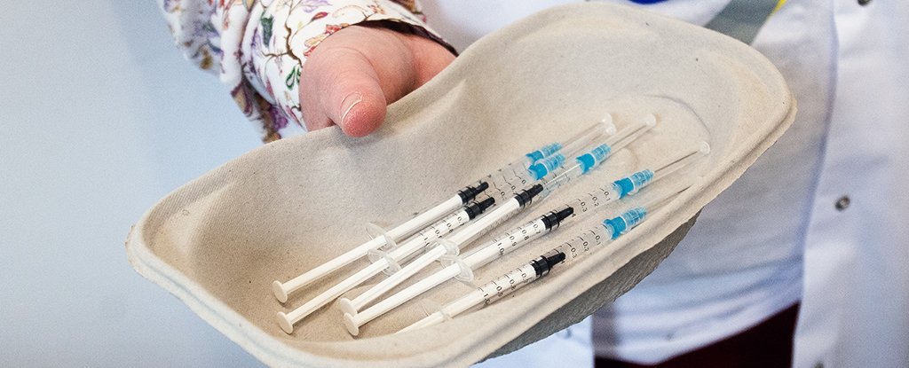 Health professional with vaccine supplies on 18 March in Belgium. 