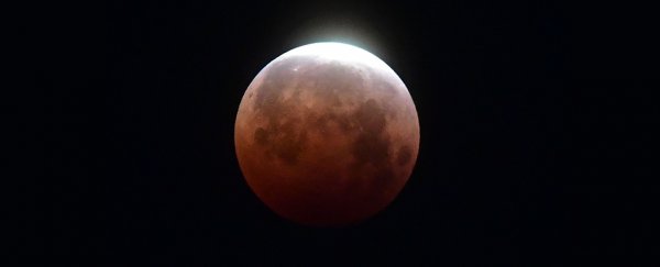 Astonishing pics from around the world showcase the total lunar eclipse