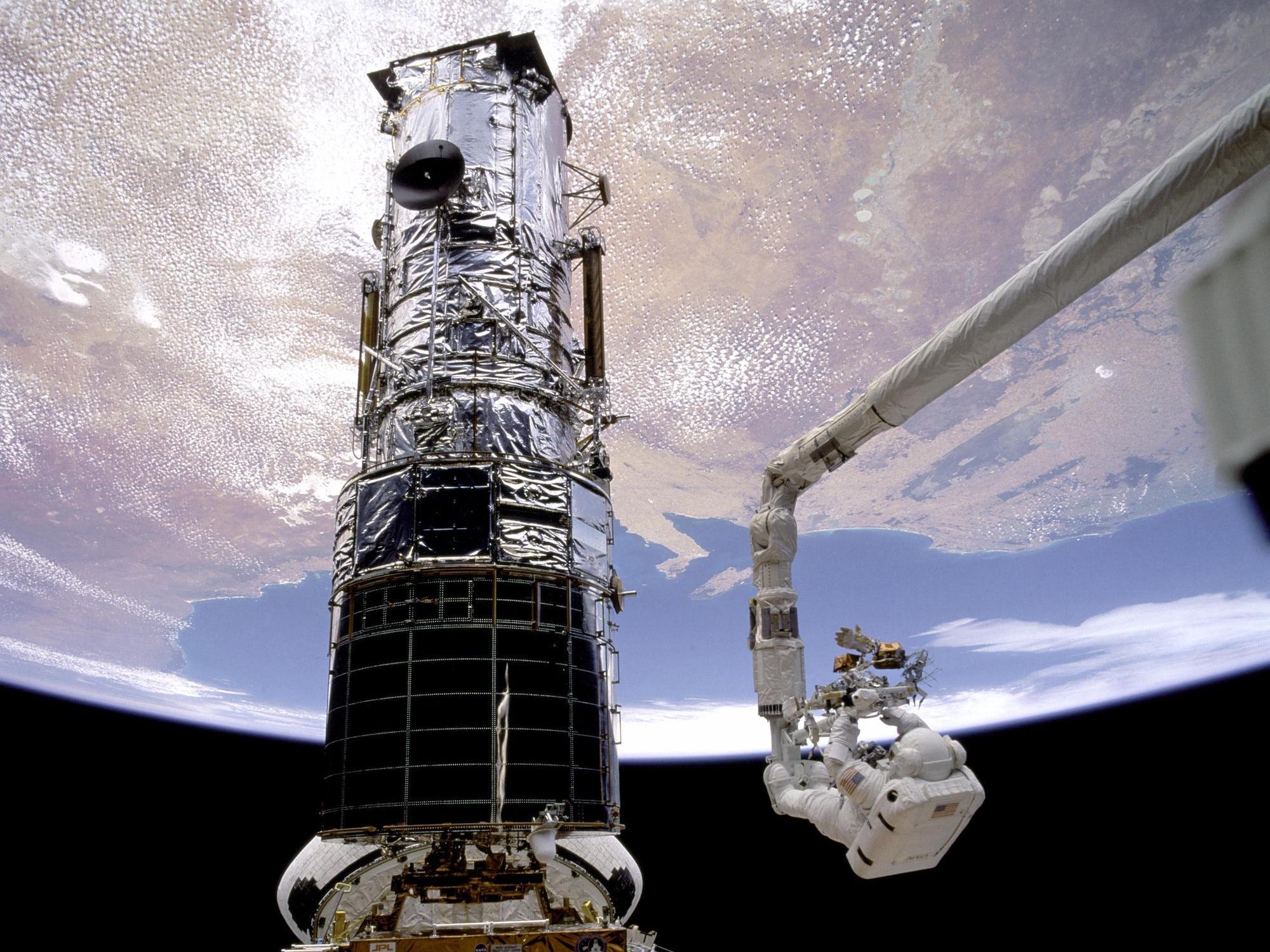 Astronauts have visited Hubble for repairs and maintenance on five occasions. (NASA)