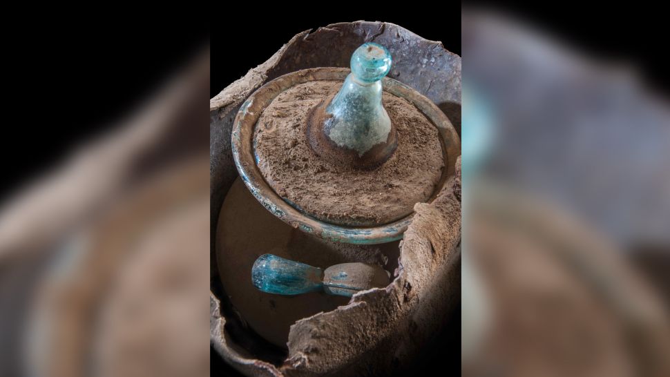 Blue glass urn found in the tomb of Marcus Venerius Secundio. The urn likely contains the cremated remains of a woman named Novia Amabilis. (Courtesy Archaeological Park of Pompeii/University of Valencia)