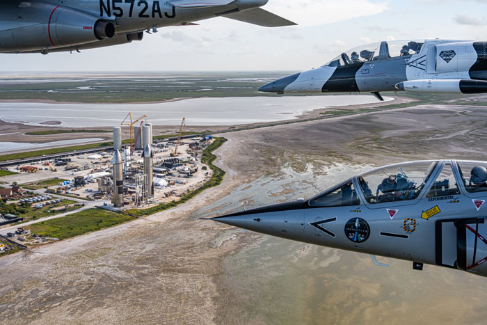 The Inspiration4 crew flies jets above SpaceX's facilities in Boca Chica, Texas.