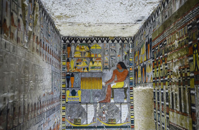 The walls of Khuwy's tomb filled with hieroglyphics.