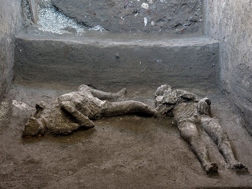 Remains of two men killed in the eruption of Pompeii, 79 CE. (Luigi Spina/Reuters)