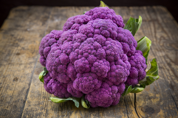 Purple Cauliflower On A Wooden Deck