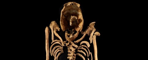 Archaeologists dug up an old skeleton. Then they noticed something very strange