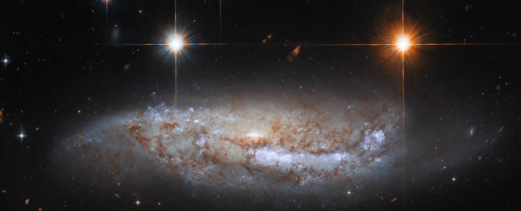 Feast Your Eyes on The Last Hubble Pic For 2021 – A Distant, Smirking Galaxy