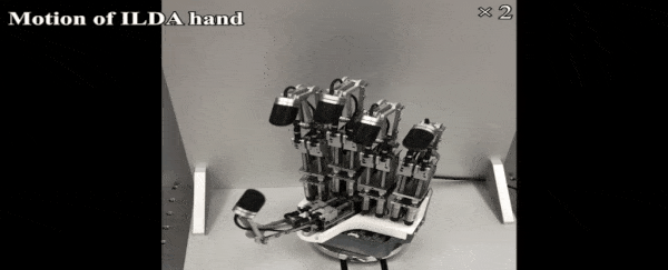 This Robotic Hand Is Precise Enough to Move a Microchip With Tweezers