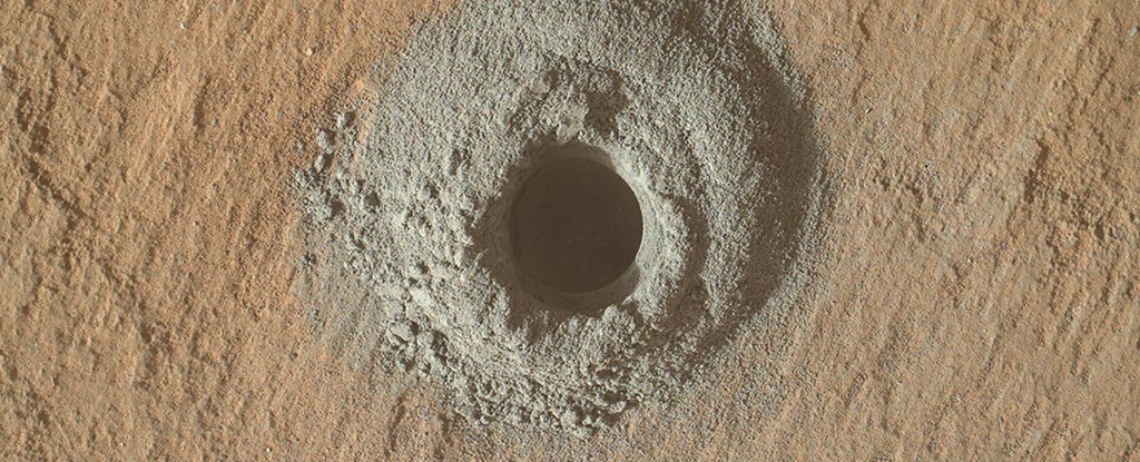 One of the drill holes used to sample sediment in the Gale crater. 