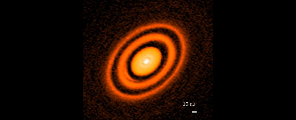 Rings of 'Mega Saturn' 400 light years from Earth spin the wrong way |  Daily Mail Online