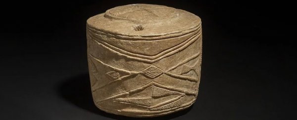 Incredible 5,000-year-old drum found in the grave of 'cuddling' prehistoric children