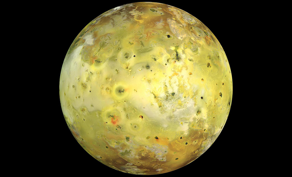 Yellow moon with loads of speckles on the surface