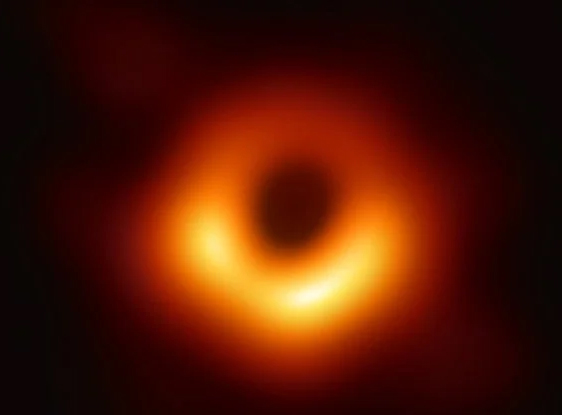 Glowing orange ring on a black background, with a fog of red surrounding it