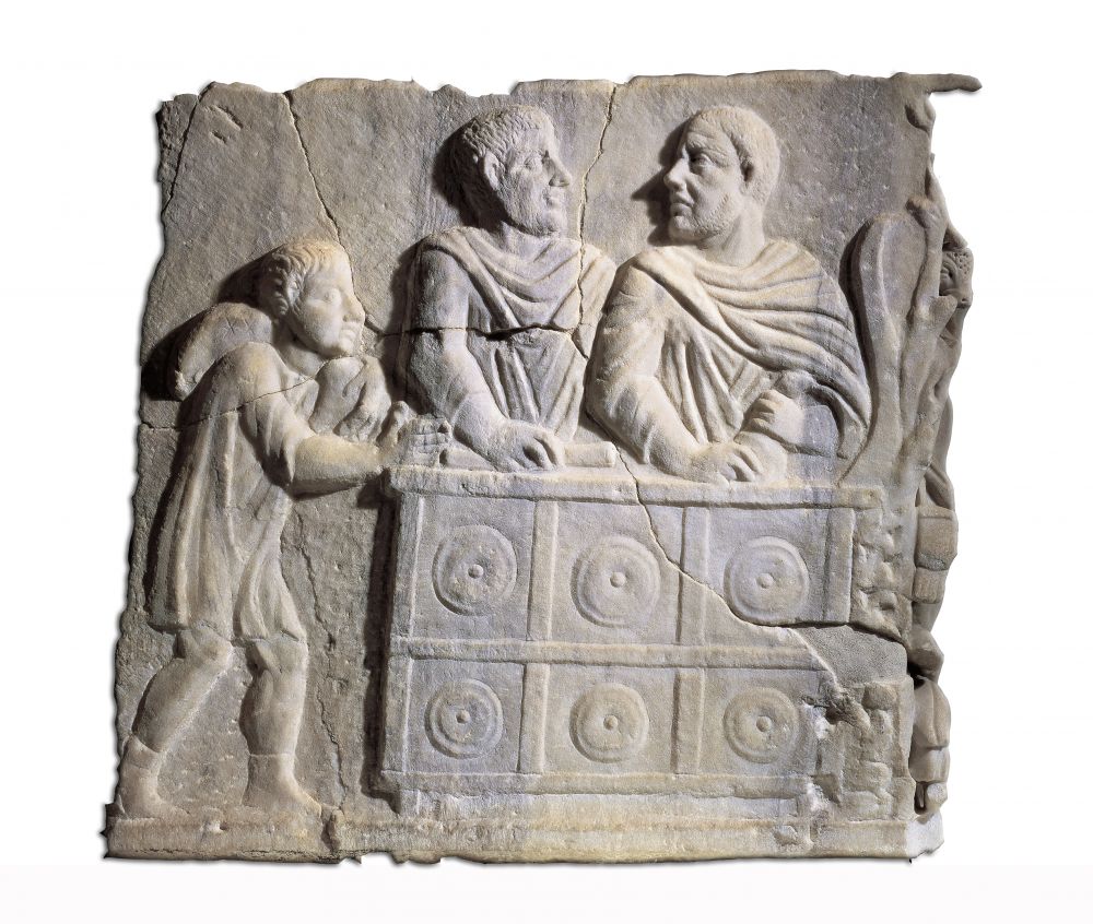 Depiction of a money changer (precursor of a banker) in Rome. (DeAgostini/Leemage/Museum of Roman Civil­isation, Rome)