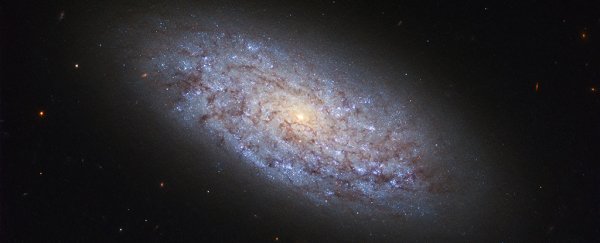 This is how dark matter and regular matter 'talk' to each other, claims wild new paper