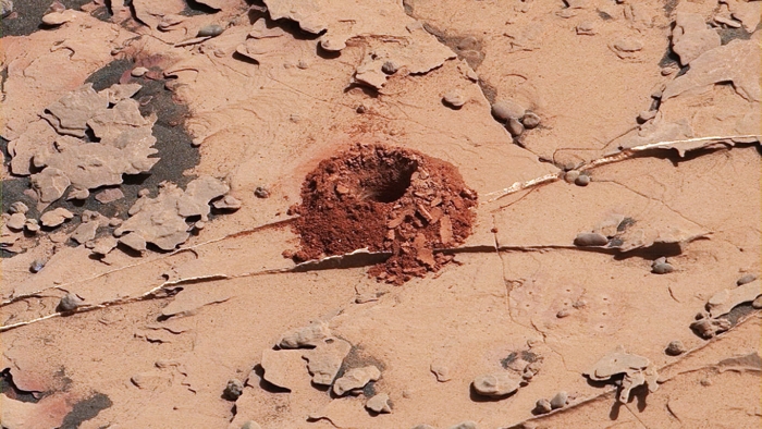 Mars Has So Much Radiation, Any Signs of Life Would Be Buried Six Feet Under  HoleDrilledInMartianSurface