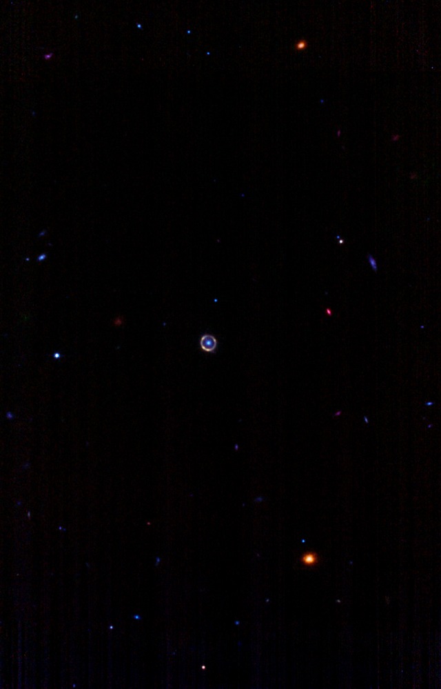 Far away view of a yellow ring in space