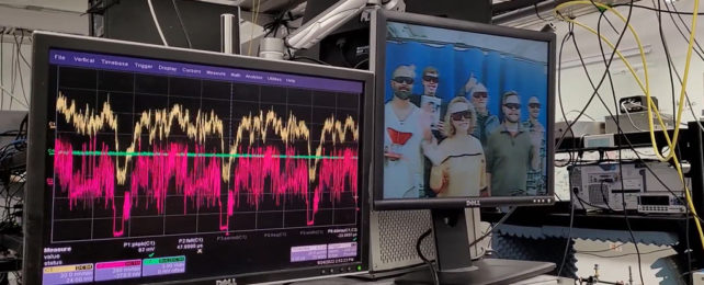 Screen showing video transmitted via atoms