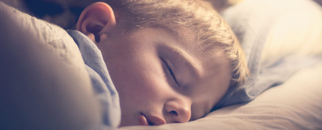 Sleeping boy with closed eyes