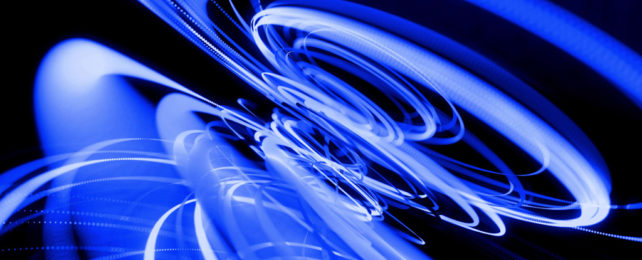 Curvy swirls of blue laser light.