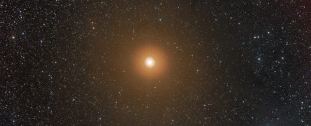 Betelgeuse Star Seen Against Starry Backdrop