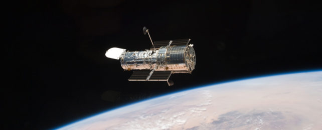 The Hubble Space Telescope in orbit around Earth.