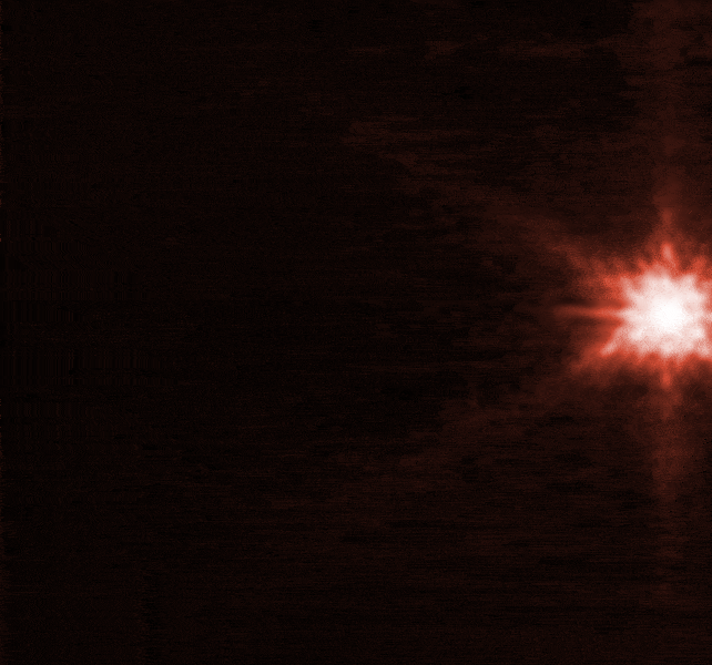 Een explosie van rode flits in de ruimte.
