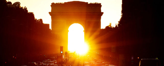 Sunset at the Arc de Triomphe in Paris.