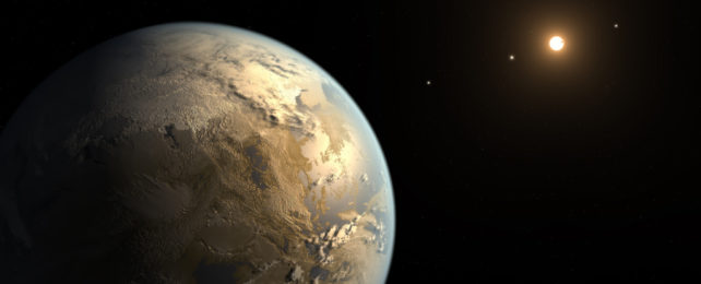 An illustration of Kepler-186f, an Earth-size exoplanet, in the light of a distant red dwarf star.