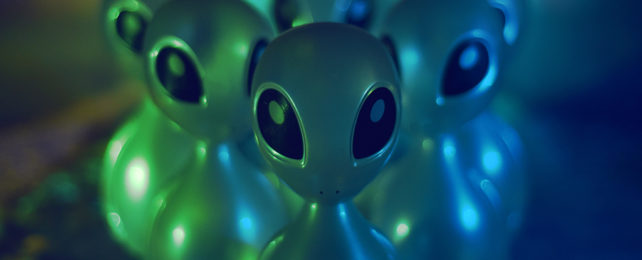 A group of green alien toys