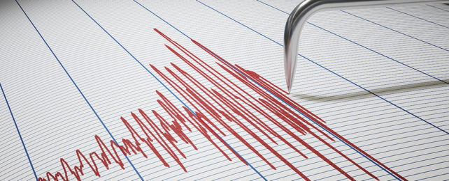 Jagged red line of a seismograph recording