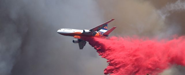 Airplane Drops Fire Retardant
