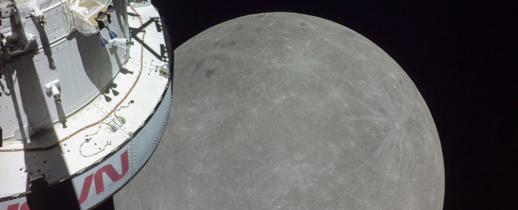 The Orion capsule flies by the Moon's far side.