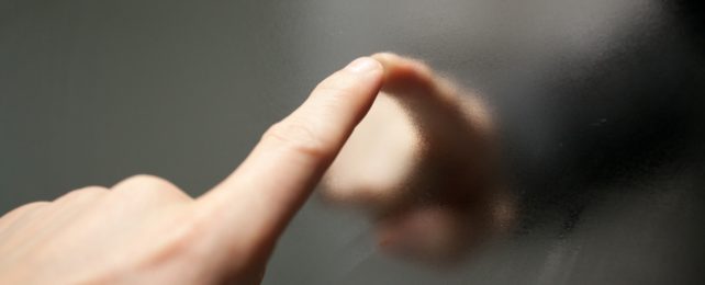Finger Touches Mirror