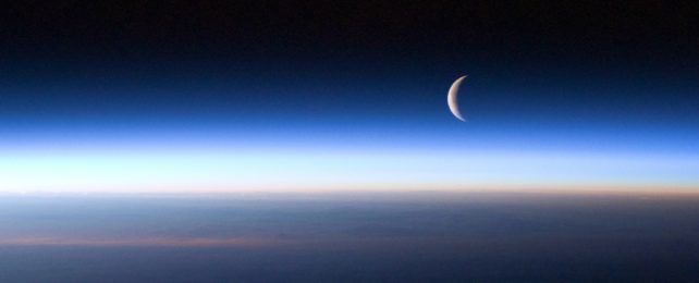 Moon Seen Above Earth Atmosphere