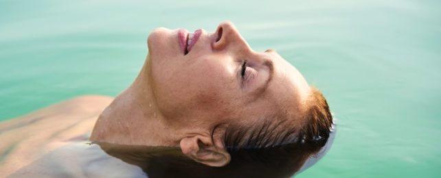 Woman Floats In Water