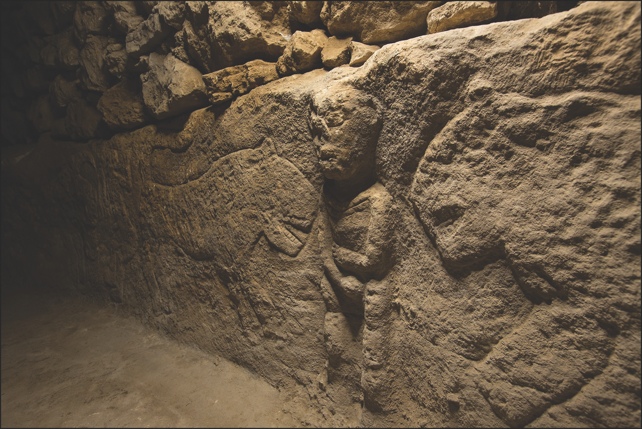 Ancient Carving Of Man Gripping Penis