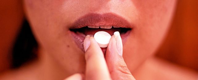 Woman Swallows Pill