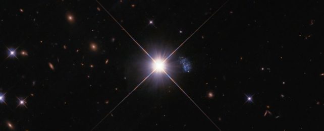 'Peekaboo' Galaxy Emerges From Hiding, And It's A Time Capsule of The Universe
