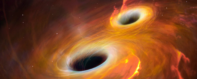 An illustration of two black holes merging, their accretion discs swirls of yellow and orange.