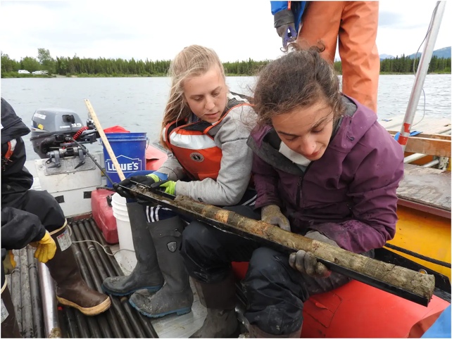 Researchers on boat