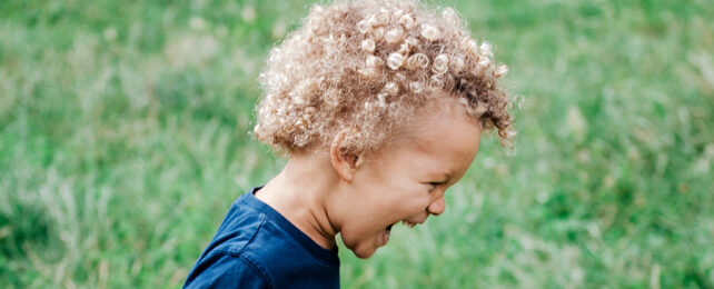 young boy with blonde curls