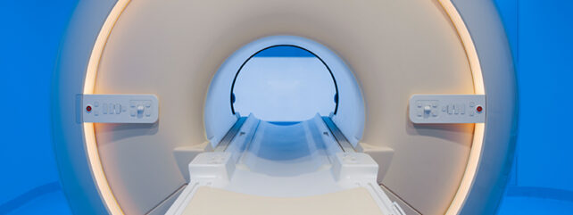 mri scanner front on with blue background
