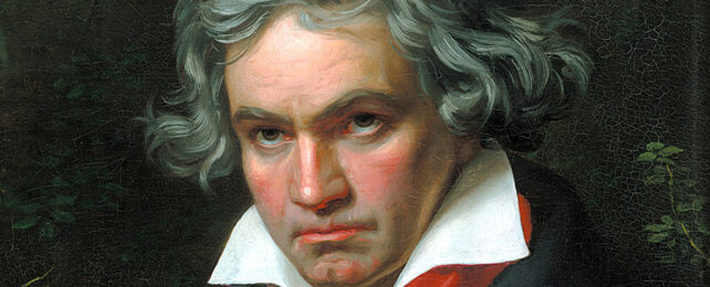 Portrait of Beethoven with greying hair against a green background