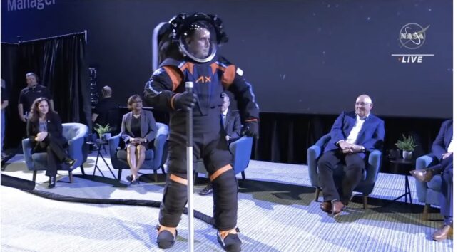 Engineer demonstrating the new prototype spacesuit