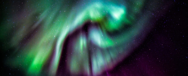 The northern lights in a starry sky.
