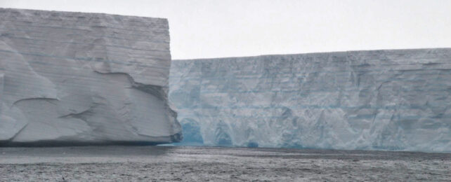 Towering rectangular iceberg as viewed from sea level