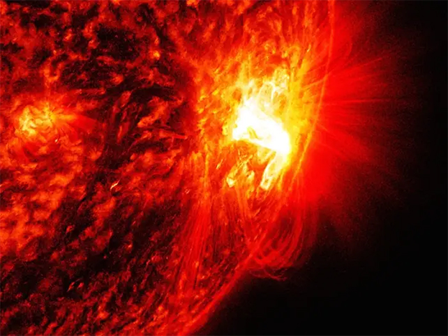 Extreme 'X-Class' Solar Flare Hits Earth, Causing Radio Blackout Mid_level_flare_sun