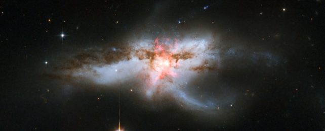 Black Holes So Massive They Shouldn't Exist Could Spawn From a Rare Triple Merger