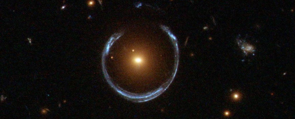 New study of Einstein rings says dark matter behaves like a wave, not a particle: ScienceAlert