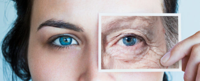 Photo of an aged eye over a woman's face